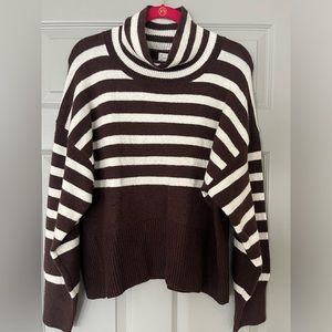 A new day sweater, brand new